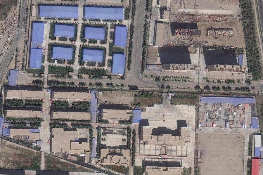 A+satellite+image+taken+in+September+shows+an+internment+camp+in+Xinjiang.+The+buildings+in+the+upper+left+corner+appear+to+be+of+a+design+commonly+used+by+factories.